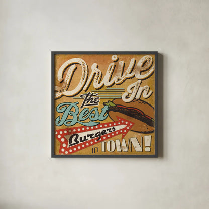 Diners and Drive Ins I by Pela Studio. Shown in a sleek black glass frame for a contemporary gallery look. Available as an archival giclee rolled canvas, fine art paper, or poster print. SKU 13128a.