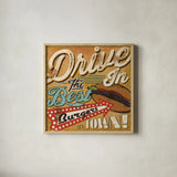 Diners and Drive Ins I by Pela Studio. Shown in a natural wood glass frame for a timeless modern aesthetic. Available as an archival giclee rolled canvas, fine art paper, or poster print. SKU 13128a.