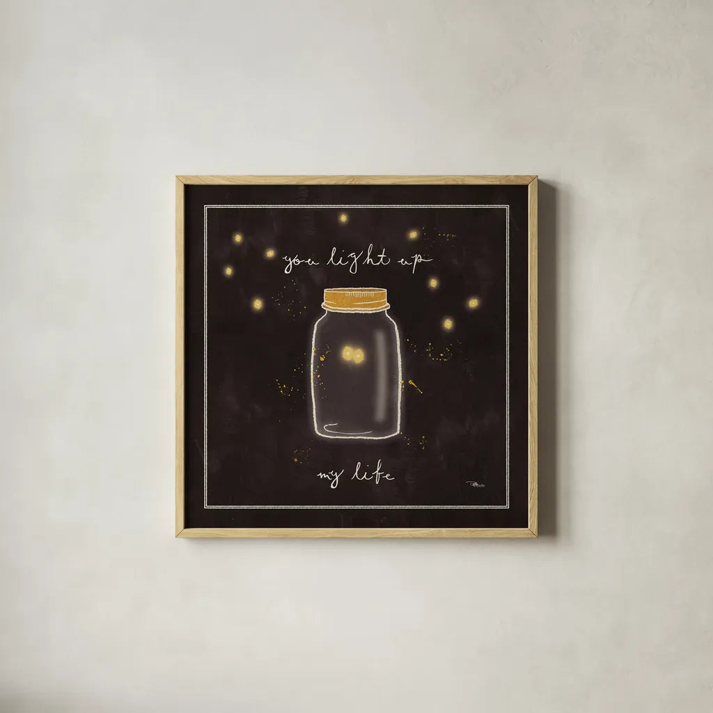 Firefly Glow I by Pela Studio. Shown in a natural wood glass frame for a timeless modern aesthetic. Available as an archival giclee rolled canvas, fine art paper, or poster print. SKU 17214a.