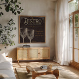 Flavors of France VI by Pela Studio. Shown in a natural wood frame in a cozy modern living room. Available as an archival giclee rolled canvas, fine art paper, or poster print. SKU 10990a.