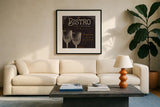 Flavors of France VI by Pela Studio. Displayed in a glass frame with matte in a clean modern living room. Available as an archival giclee rolled canvas, fine art paper, or poster print. SKU 10990a.