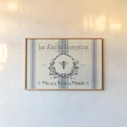 French Farmhouse I by Pela Studio. shown as a paper print in a natural frame. Available as a archival giclee rolled canvas, fine art paper, or poster print. SKU 45584i.