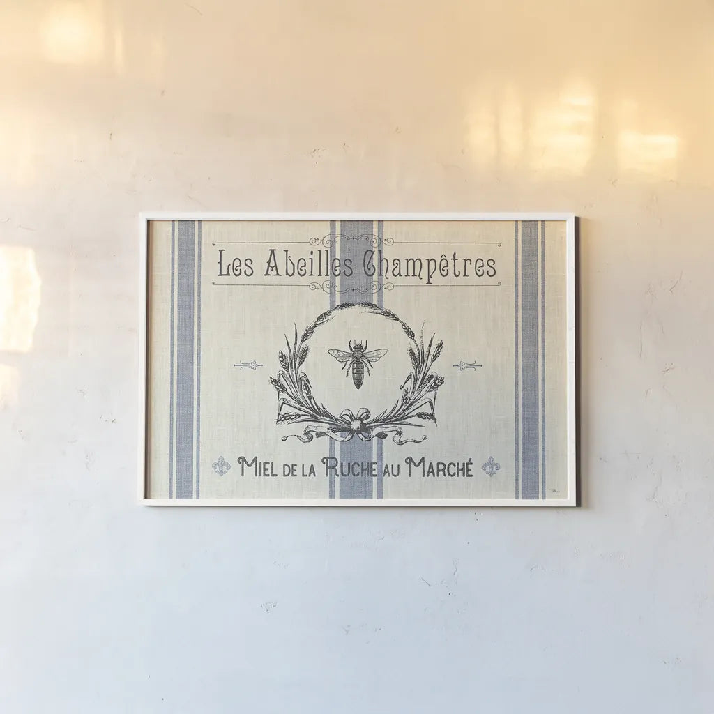 French Farmhouse I by Pela Studio. shown as a paper print in a white frame. Available as a archival giclee rolled canvas, fine art paper, or poster print. SKU 45584i.