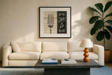 French Menu II by Pela Studio. Displayed in a glass frame with matte in a clean modern living room. Available as an archival giclee rolled canvas, fine art paper, or poster print. SKU 6823a.