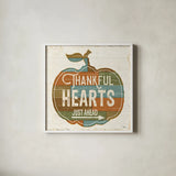 Harvest Signs I by Pela Studio. Shown in a crisp white glass frame for a clean and minimalist style. Available as an archival giclee rolled canvas, fine art paper, or poster print. SKU 35218a.