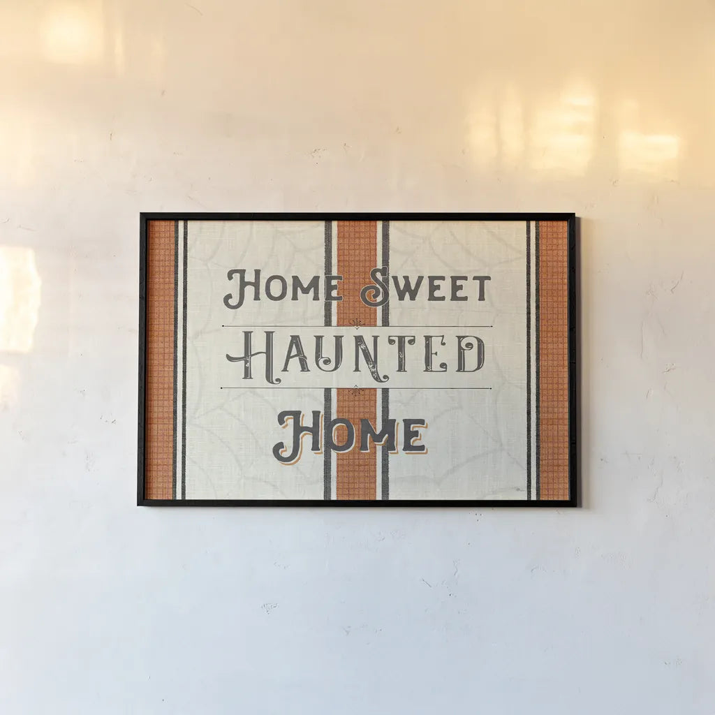 Home Sweet Haunted Home by Pela Studio. shown as a paper print in a black flame. Available as a archival giclee rolled canvas, fine art paper, or poster print. SKU 57875i.
