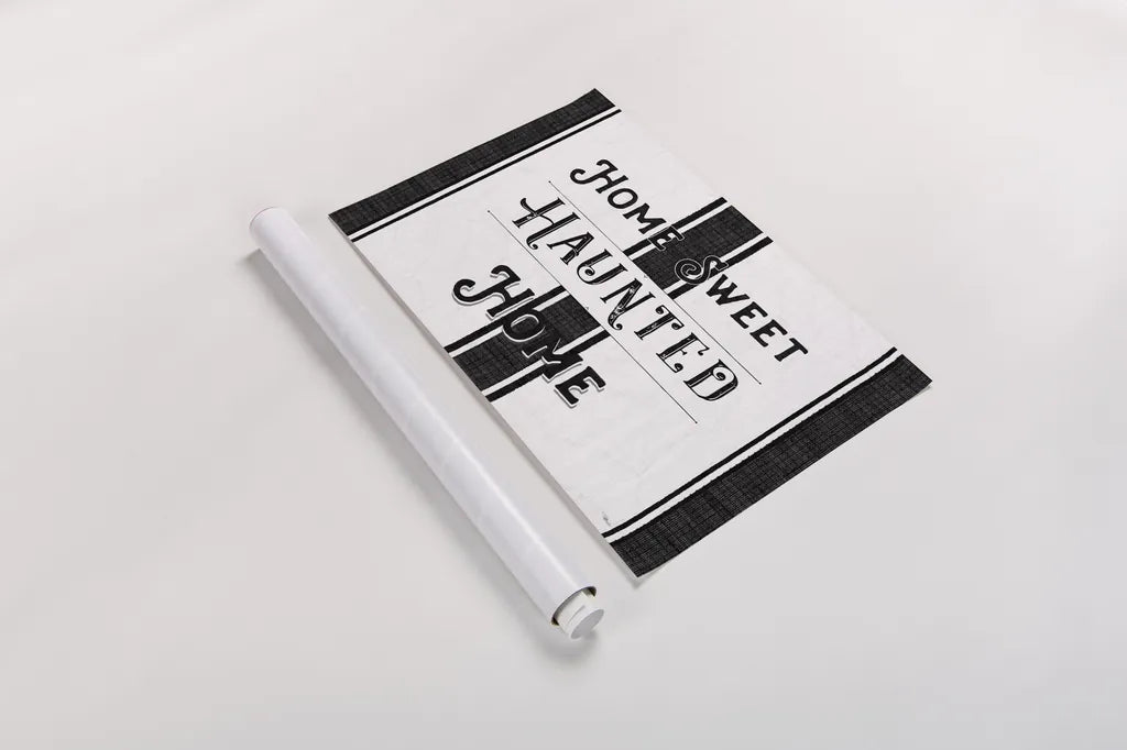 Home Sweet Haunted Home BW by Pela Studio. shown as a rolled paper print. Available as archival giclee rolled canvas, fine art paper, or poster print. SKU 68426i.