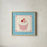 Lil Cupcakes I by Pela Studio. Shown in a natural wood glass frame for a timeless modern aesthetic. Available as an archival giclee rolled canvas, fine art paper, or poster print. SKU 29482a.