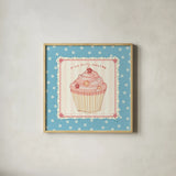Lil Cupcakes III by Pela Studio. Shown in a natural wood glass frame for a timeless modern aesthetic. Available as an archival giclee rolled canvas, fine art paper, or poster print. SKU 29480a.