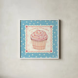 Lil Cupcakes IV by Pela Studio. Shown in a crisp white glass frame for a clean and minimalist style. Available as an archival giclee rolled canvas, fine art paper, or poster print. SKU 29481a.