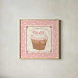 Lil Cupcakes Pink II by Pela Studio. Shown in a natural wood glass frame for a timeless modern aesthetic. Available as an archival giclee rolled canvas, fine art paper, or poster print. SKU 100984a.