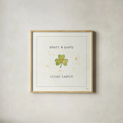 Lucky Cuties I by Pela Studio. Shown in a natural wood glass frame for a timeless modern aesthetic. Available as an archival giclee rolled canvas, fine art paper, or poster print. SKU 38552a.