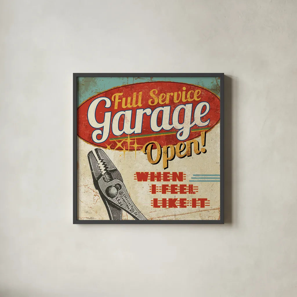 Mancave I - Full Service Garage by Pela Studio. Shown in a sleek black glass frame for a contemporary gallery look. Available as an archival giclee rolled canvas, fine art paper, or poster print. SKU 10311a.