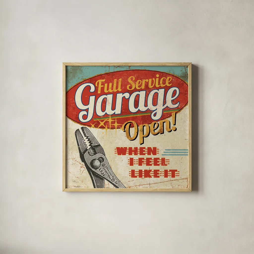 Mancave I - Full Service Garage by Pela Studio. Shown in a natural wood glass frame for a timeless modern aesthetic. Available as an archival giclee rolled canvas, fine art paper, or poster print. SKU 10311a.