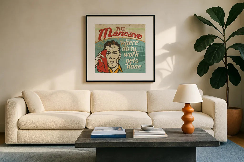 Mancave III - Where Dirty Work Gets Done by Pela Studio. Displayed in a glass frame with matte in a clean modern living room. Available as an archival giclee rolled canvas, fine art paper, or poster print. SKU 10313a.