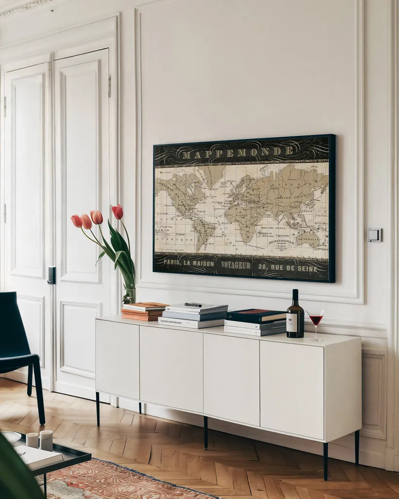 Mappemonde by Pela Studio. shown as a framed stretched canvas in a living room above a console. Available as a archival giclee rolled canvas, fine art paper, or poster print. SKU 8315i.