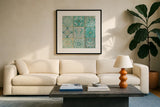 Ocean Tales I by Pela Studio. Displayed in a glass frame with matte in a clean modern living room. Available as an archival giclee rolled canvas, fine art paper, or poster print. SKU 12833a.