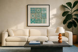 Ocean Tales II by Pela Studio. Displayed in a glass frame with matte in a clean modern living room. Available as an archival giclee rolled canvas, fine art paper, or poster print. SKU 12834a.