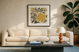 Perfect Petals II Yellow by Pela Studio. Displayed in a glass frame with matte in a clean modern living room. Available as an archival giclee rolled canvas, fine art paper, or poster print. SKU 13174a.