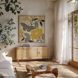 Perfect Petals IV Yellow by Pela Studio. Shown in a natural wood frame in a cozy modern living room. Available as an archival giclee rolled canvas, fine art paper, or poster print. SKU 13165a.