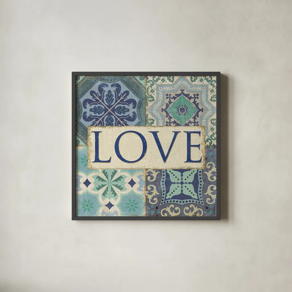 Santorini I Love by Pela Studio. Shown in a sleek black glass frame for a contemporary gallery look. Available as an archival giclee rolled canvas, fine art paper, or poster print. SKU 12150a.