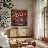 Street Machines I by Pela Studio. Shown in a natural wood frame in a cozy modern living room. Available as an archival giclee rolled canvas, fine art paper, or poster print. SKU 13201a.
