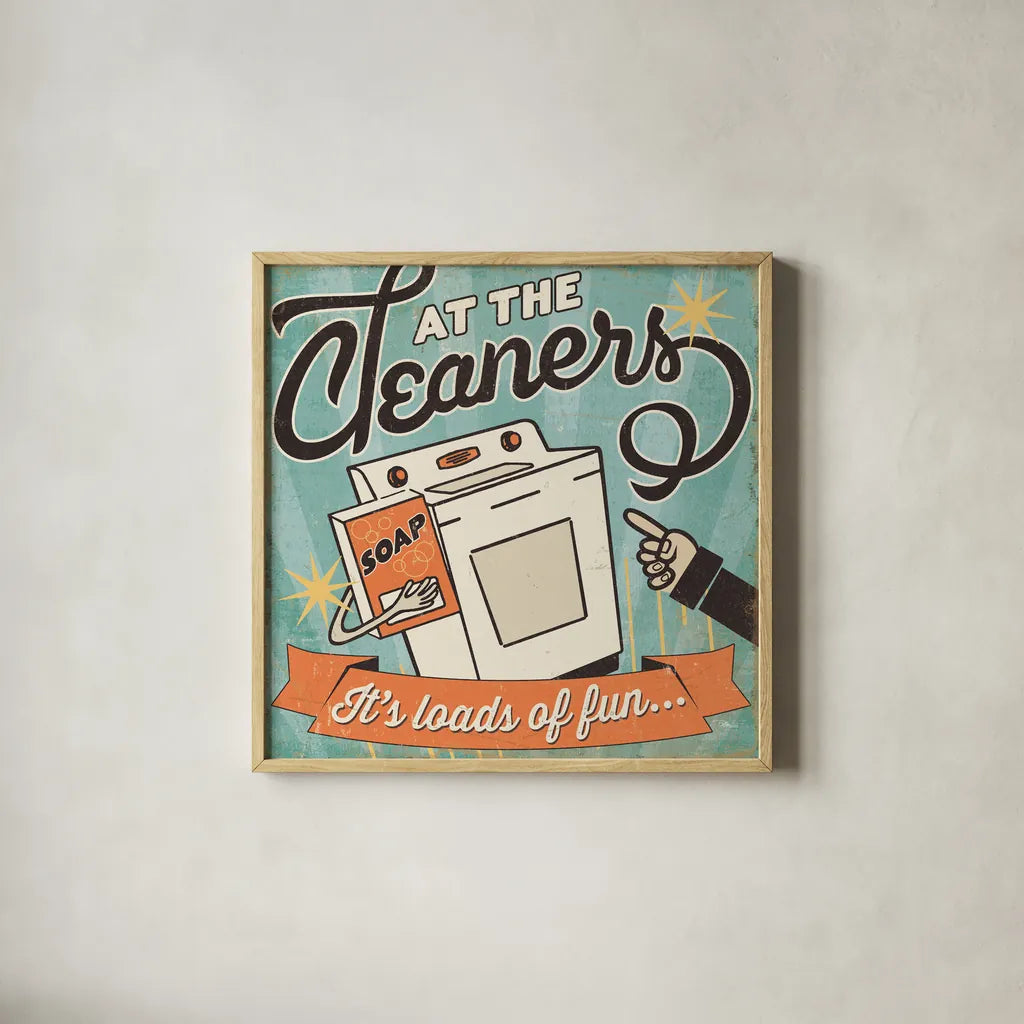 The Cleaners II by Pela Studio. Shown in a natural wood glass frame for a timeless modern aesthetic. Available as an archival giclee rolled canvas, fine art paper, or poster print. SKU 14795a.