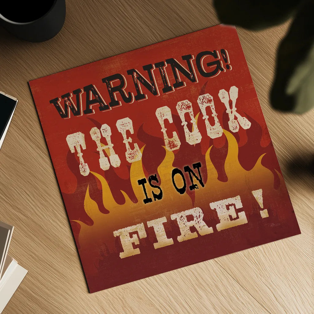 The Cook is On Fire by Pela Studio. Shown as a detailed flat fine art print, highlighting archival giclee quality. Available as an archival giclee rolled canvas, fine art paper, or poster print. SKU 92148a.