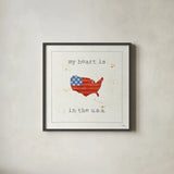USA Cuties II by Pela Studio. Shown in a sleek black glass frame for a contemporary gallery look. Available as an archival giclee rolled canvas, fine art paper, or poster print. SKU 24163a.
