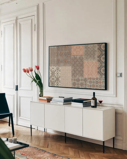 Venetian Patchwork I Orange Gray by Pela Studio. shown as a framed stretched canvas in a living room above a console. Available as a archival giclee rolled canvas, fine art paper, or poster print. SKU 55378i.