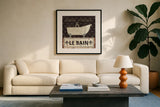 Vintage Bath VI by Pela Studio. Displayed in a glass frame with matte in a clean modern living room. Available as an archival giclee rolled canvas, fine art paper, or poster print. SKU 13513a.