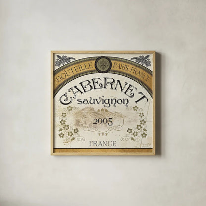 Wine Labels I by Pela Studio. Shown in a natural wood glass frame for a timeless modern aesthetic. Available as an archival giclee rolled canvas, fine art paper, or poster print. SKU 12859a.