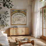 Wine Labels I by Pela Studio. Shown in a natural wood frame in a cozy modern living room. Available as an archival giclee rolled canvas, fine art paper, or poster print. SKU 12859a.