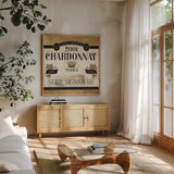 Wine Labels II by Pela Studio. Shown in a natural wood frame in a cozy modern living room. Available as an archival giclee rolled canvas, fine art paper, or poster print. SKU 12860a.