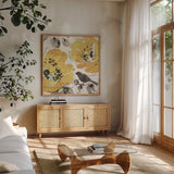 Watercolorful II by Pela. Shown in a natural wood frame in a cozy modern living room. Available as an archival giclee rolled canvas, fine art paper, or poster print. SKU 22008a.