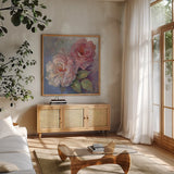 Roses on Blue I Crop by Peter McGowan. Shown in a natural wood frame in a cozy modern living room. Available as an archival giclee rolled canvas, fine art paper, or poster print. SKU 32565a.