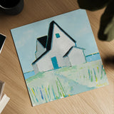 Cottage by the Sea by Phyllis Adams. Shown as a detailed flat fine art print, highlighting archival giclee quality. Available as an archival giclee rolled canvas, fine art paper, or poster print. SKU 27247a.