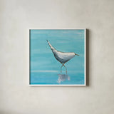 Egret I Bright by Phyllis Adams. Shown in a crisp white glass frame for a clean and minimalist style. Available as an archival giclee rolled canvas, fine art paper, or poster print. SKU 27681a.