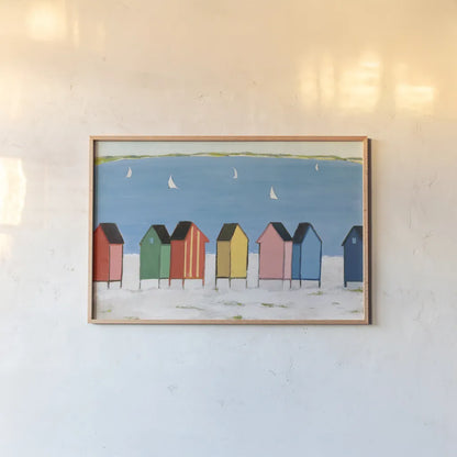 Kitschy Cabanas I by Phyllis Adams. shown as a paper print in a natural frame. Available as a archival giclee rolled canvas, fine art paper, or poster print. SKU 88628i.