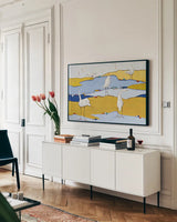 Marsh Egrets VI by Phyllis Adams. shown as a framed stretched canvas in a living room above a console. Available as a archival giclee rolled canvas, fine art paper, or poster print. SKU 27235i.