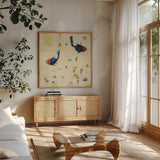 One Fish Two Fish by Phyllis Adams. Shown in a natural wood frame in a cozy modern living room. Available as an archival giclee rolled canvas, fine art paper, or poster print. SKU 27243a.