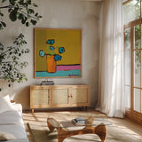 Orange Vase by Phyllis Adams. Shown in a natural wood frame in a cozy modern living room. Available as an archival giclee rolled canvas, fine art paper, or poster print. SKU 27316a.