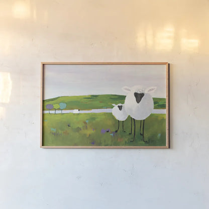 Sheep in the Meadow by Phyllis Adams. shown as a paper print in a natural frame. Available as a archival giclee rolled canvas, fine art paper, or poster print. SKU 27254i.