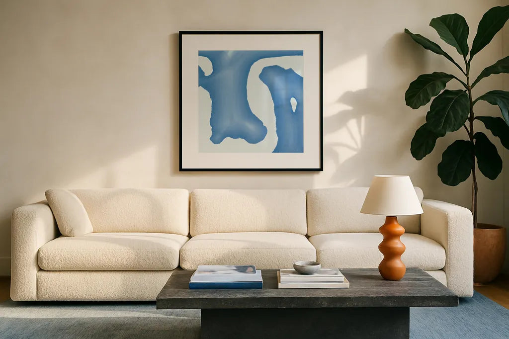 Batik Blue I by Piper Rhue. Displayed in a glass frame with matte in a clean modern living room. Available as an archival giclee rolled canvas, fine art paper, or poster print. SKU 32794a.