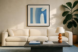 Batik Blue IV by Piper Rhue. Displayed in a glass frame with matte in a clean modern living room. Available as an archival giclee rolled canvas, fine art paper, or poster print. SKU 34420a.