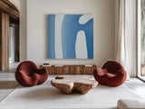 Batik Blue IV by Piper Rhue. Shown as extra-large giant wall art in a modern living room. Available as an archival giclee rolled canvas, fine art paper, or poster print. SKU 34420a.