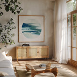Dark Matter Blue I by Piper Rhue. Shown in a natural wood frame in a cozy modern living room. Available as an archival giclee rolled canvas, fine art paper, or poster print. SKU 53961a.