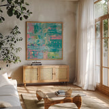 Islands Abstract II by Piper Rhue. Shown in a natural wood frame in a cozy modern living room. Available as an archival giclee rolled canvas, fine art paper, or poster print. SKU 52193a.