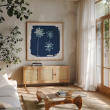 Nature By The Lake - Flowers III by Piper Rhue. Shown in a natural wood frame in a cozy modern living room. Available as an archival giclee rolled canvas, fine art paper, or poster print. SKU 50091a.