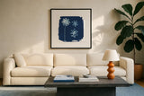 Nature By The Lake - Flowers III by Piper Rhue. Displayed in a glass frame with matte in a clean modern living room. Available as an archival giclee rolled canvas, fine art paper, or poster print. SKU 50091a.